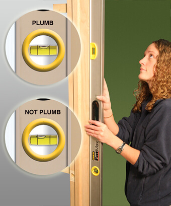 Checking door frame for plumb